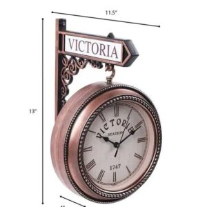 Victorian-style gold and black double-sided wall clock with intricate frame and Roman numerals.