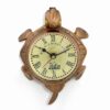 Vintage brass tortoise-shaped wall clock with Railway Regulator dial and Roman numerals