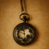 Antique black mechanical pocket watch on warm textured beige background – vintage steampunk style