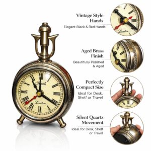 Metal vintage table clock close-up showing antique design