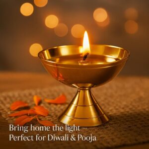 Brass Pyali Diya with burning flame during puja