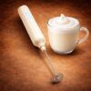 Rechargeable milk frother with stainless steel whisk for coffee foam